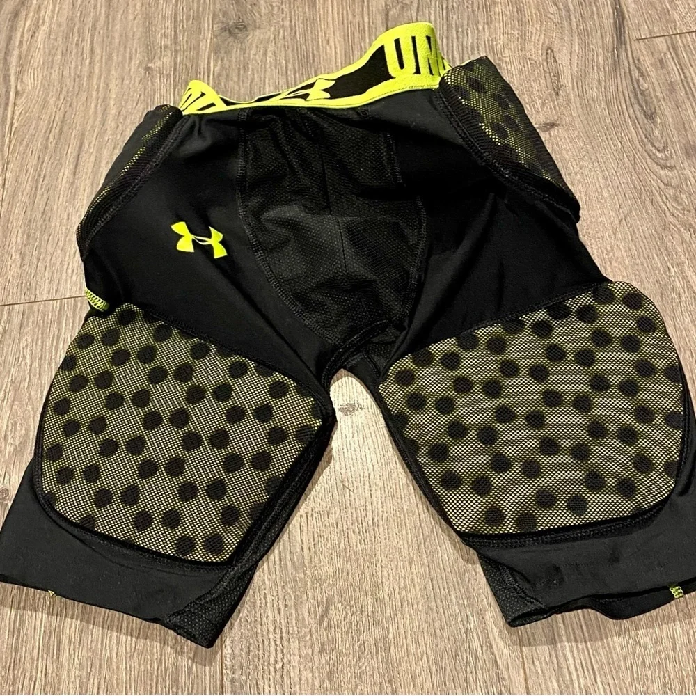 Under Armour Football padded girdle size Youth medium gameday EUC black green UA
